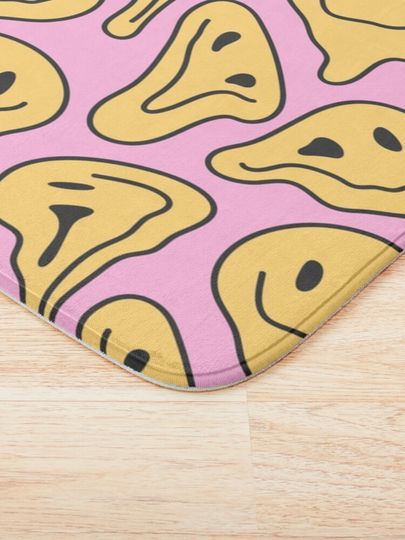 Melting smiley face Bath Mat