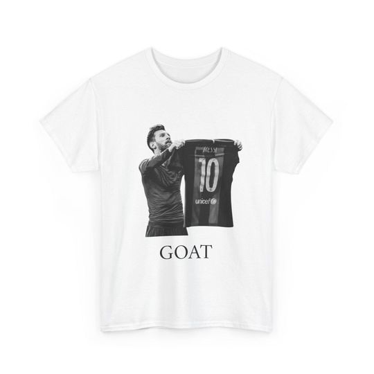 Discover Messi GOAT Shirt l Legendary jersey celebration as a football motif l Vintage graphic tee for sports fans, streetwear look & world champion vibe
