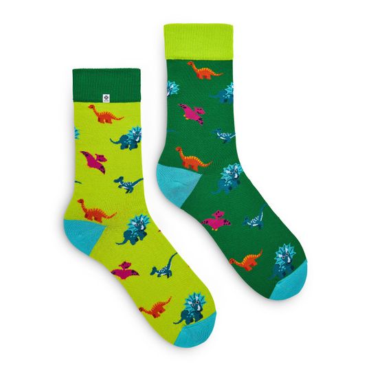 Discover Funny Dinosaurs colored socks on a green background