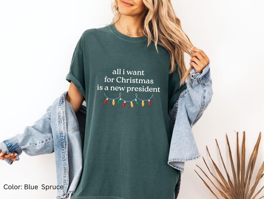 Discover Anti Trump Christmas Shirt: All I want for Christmas is a New President - Subtle Anti Trump Christmas T Shirt