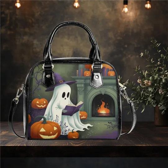 Discover Whimsical Halloween ghost reading a book near the fire Purse Satchel fun cute