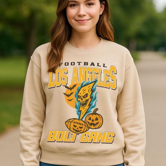 Discover Vintage Style Los Angeles Spooky Sweatshirt | Bolt Gang Halloween Football Shirt | Spooky Crow Pumpkin Shirt | Fall Sports Fan Gift
