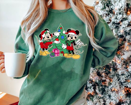 Discover Retro Mickey Minnie Christmas Tree Sweatshirt | Vintage Holiday Couple Decorating Tee 2025 | Disney Matching Xmas US