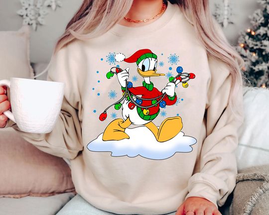 Discover Donald Duck Christmas Lights Sweatshirt | Retro Disney Holiday Shirt | Vintage Donald Disney World Family Matching Xmas Gift 2025