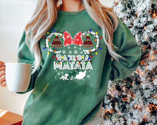 Discover Hakuna Matata Christmas Sweatshirt | Retro Lion King Disney Holiday Lights Tee 2025 | Vintage Animal Kingdom Family Matching Top