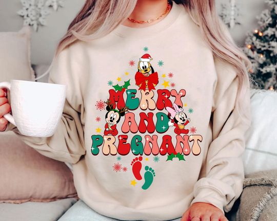 Discover Merry and Pregnant Disney Mickey Christmas Shirt | Retro Vintage Disney World Tee 2025 | Cute Pregnancy Announcement Family Matching Gift