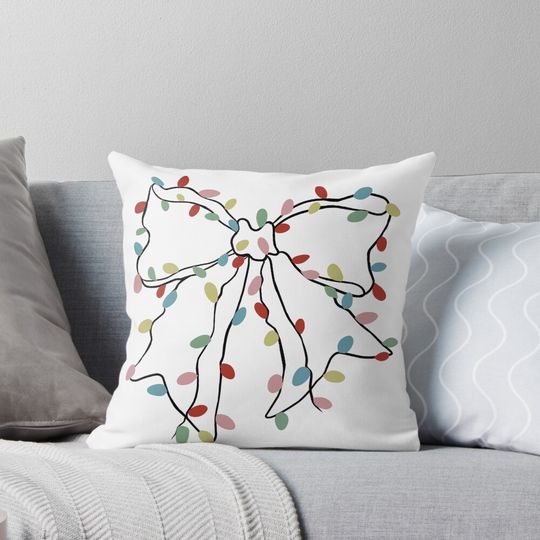 Discover Christmas Light Ribbon Bow Pillow