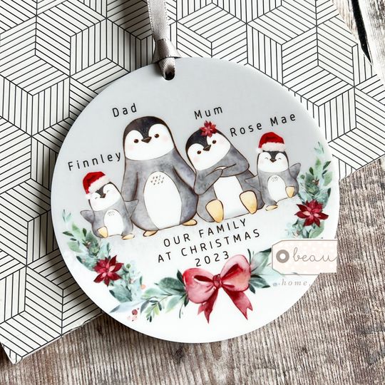 Discover Personalised Family Christmas Woodland Penguin Greenery Design Acrylic or ceramic Round Ornament Keepsake Tree decoration gift