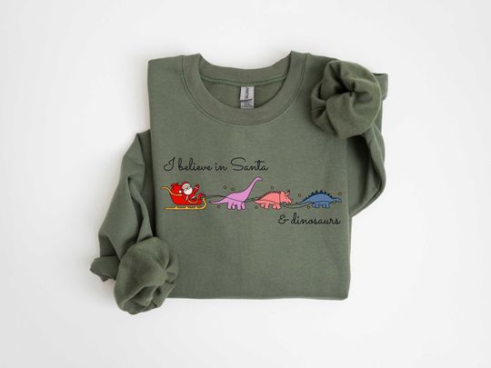 Discover I Believe in Santa and Dinosaurs, Christmas Santa Sweatshirt, Santa Sweater, Cute Dinosaur Sweatshirt, Funny Xmas Sweatshirt, Xmas Gifts