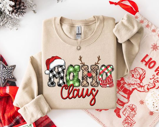 Discover Custom Christmas Mama Claus Sweatshirt, Grandma Claus Holiday Shirt, Claus Crew Holiday Sweater, Mama Gigi Mimi Nana Claus Sweatshirt