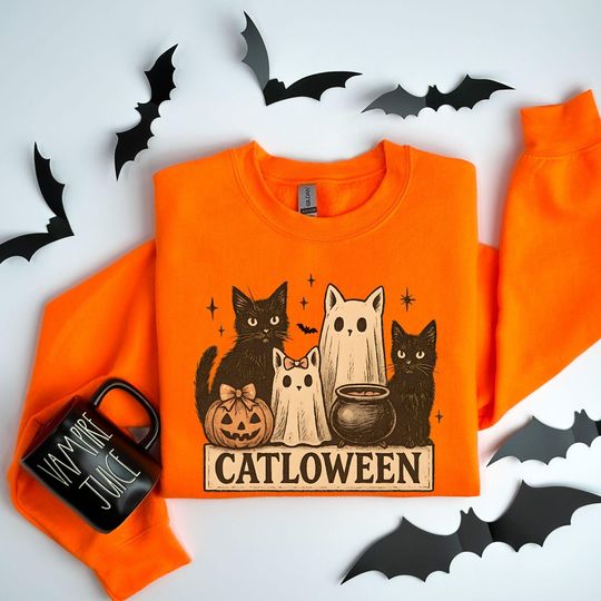 Discover Catloween Halloween Cat Sweatshirt, Ghost Cats and Pumpkin Graphic Hoodie, Cozy Fall Gift for Cat Mom, Halloween Spooky Cat Lover Apparel