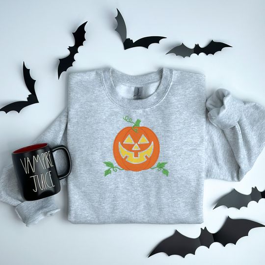 Discover Minimalist Halloween Sweatshirt: Smiling Jack-O'-Lantern Pumpkin