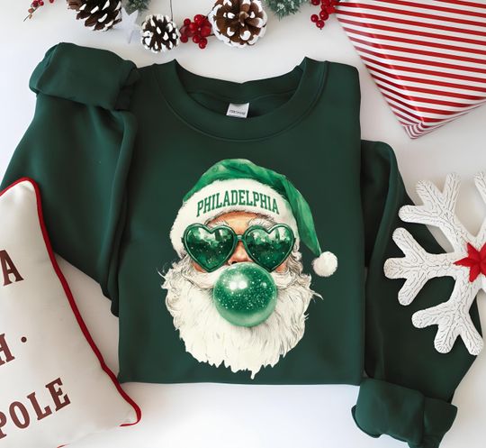 Discover Philadelphia Christmas Santa Sweatshirt  Retro Bubblegum Funny Holiday Shirt, Gummy Candy Cane Xmas Pullover, Game Day Winter Outfit