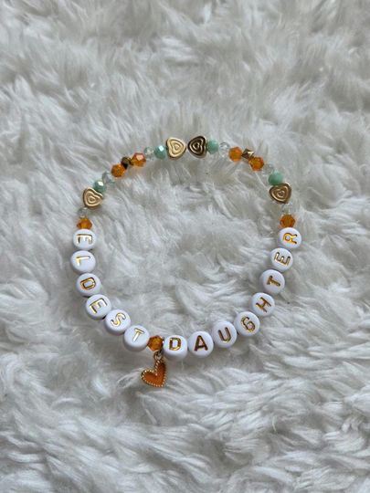 Discover Eldest Daughter - Taylorr Swifts The Life of a Showgirl Inspired Friendship Bracelet