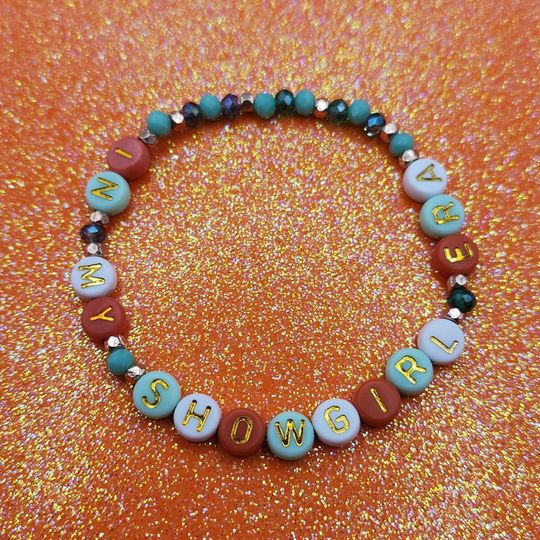 Discover In My Showgirl Era, Stretchy Friendship Bracelet, White Orange And Mint Green Letter Beads, Gold And Green Accents, New T.S Album