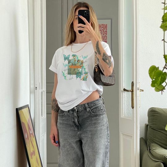 Discover Showgirl Era Taylor Unisex Tee, Vintage Graphic Shirt, Bohemian Fashion Top, Trendy Apparel for Music Festivals, Retro Style T-Shirt