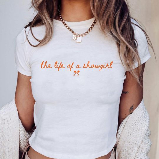 Discover Showgirl Era Baby Tee: Y2K Graphic Concert Shirt