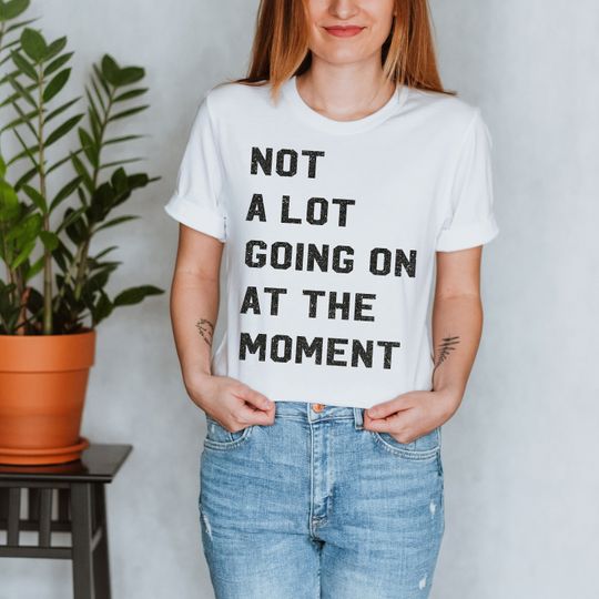 Discover Not alot Going on at the moment t-shirt with REAL black Glitter, 22nd shirt Taylor concert shirt feeling 22 getting back era, swift tee