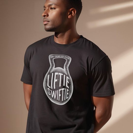 Discover Liftie taylor version Weightlifting Shirt with Kettlebell Design (Front or Back), "Stay Strong for Taylor" Gym T-Shirt for Fans of Eras Tour Merch