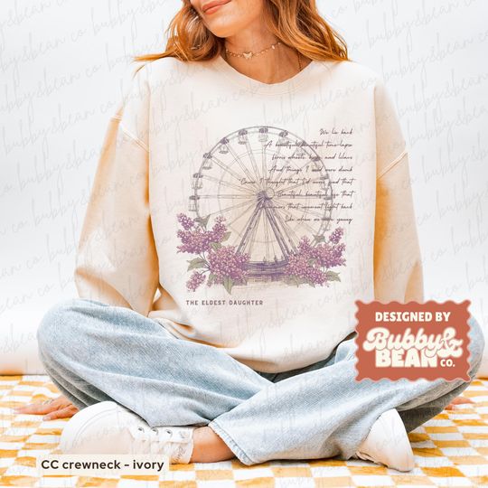 Discover Eldest Daughter Showgirl Inspired Graphic Comfort Colors Crewneck Sweater, Ferris Wheels, Kisses, and Lilacs,