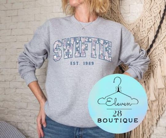 Discover taylor version Crew Neck Sweatshirt | Sport Gray | taylor version University Style
