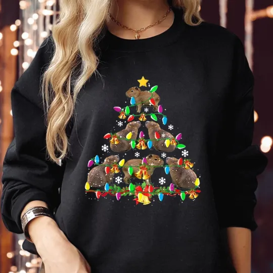 Discover SWEATSHIRT (5373) Festive Capybara Christmas Tree Cute Holiday Light Xmas Jumper
