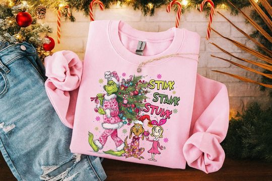 Discover Sti Sta Stu funny character Christmas Sweatshirt, Funny Pink Holiday Shirt, Max and Cindy Lou Sweater, Cute Festive Xmas Gift,Grin T-Shirt