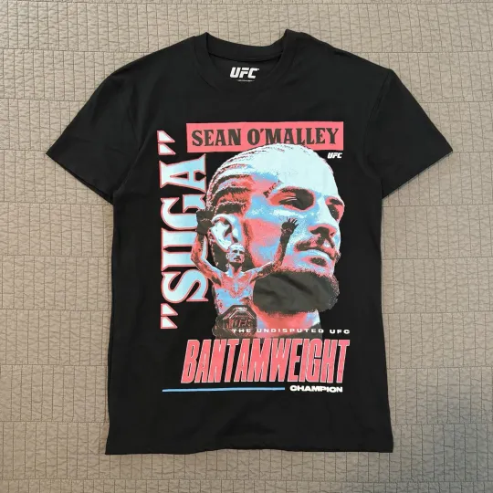 Discover UFC Men's Black T-Shirt Suga Sean O'Malley Champion MMA Graphic Tee