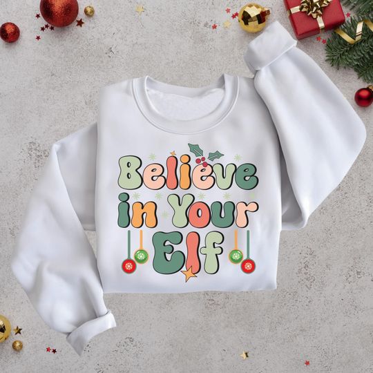 Discover Believe in Your Elf Christmas: Retro Groovy Holiday Sweatshirt