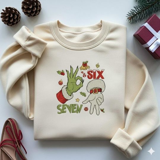 Discover EMBROIDERED Six Seven Christmas Sweatshirt, Six Seven Meme Christmas Shirt, Christmas Viral 67 Phrase Crewneck, Trending Holiday Shirt
