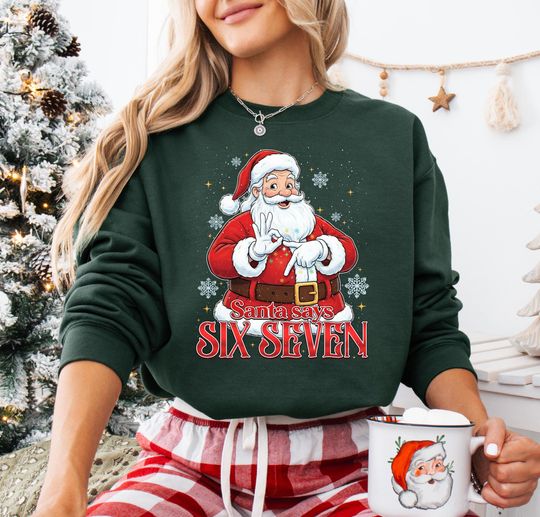 Discover Santa Says Six Seven Christmas Sweatshirt: Funny Meme Shirt