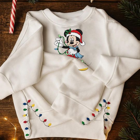 Discover Mickey Mouse Christmas Embroidered Sweatshirt, Christmas Lights Cut Hem Sweatshirt, Disney Christmas Embroidered Sweatshirt