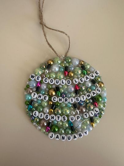 Discover Taylorr Swifts Christmas tree ornament we could leave the Christmas lights up till January