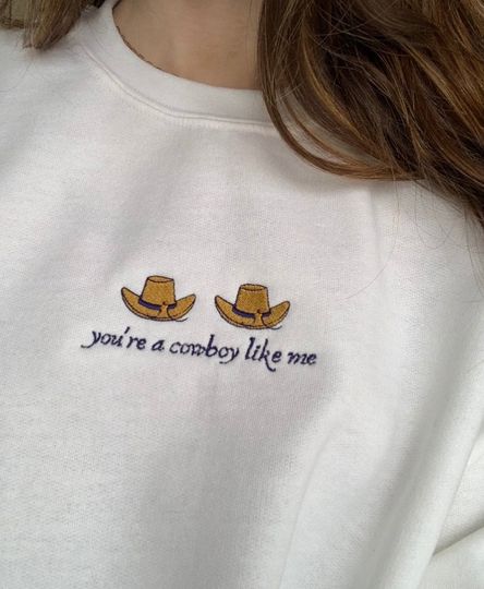 Discover Embroidered Taylorr Swifts Cowboy Like Me Unisex Sweatshirt