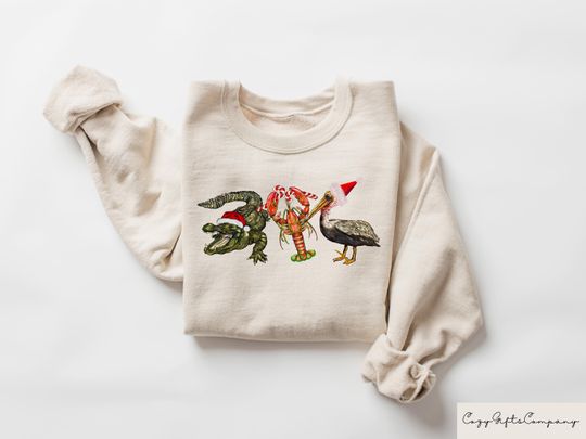 Discover Christmas Alligator Pelican Crawfish Sweatshirt, Holiday Sweater, New Year Shirt, Funny Christmas Tee, Christmas Gift, Animal Lover Outfit