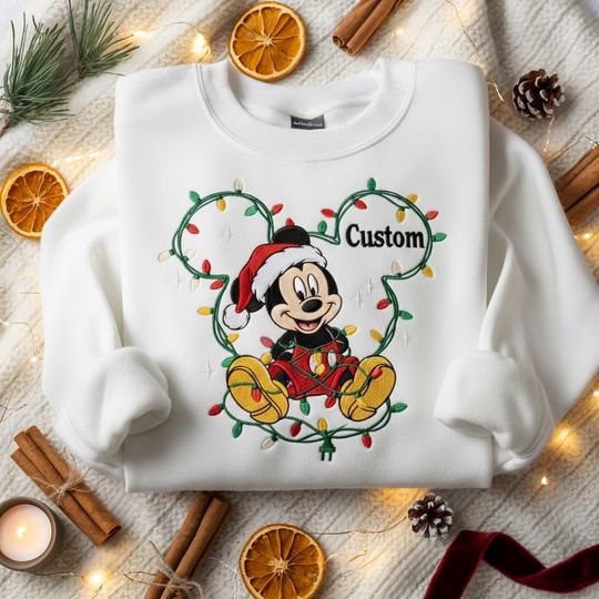 Discover EMBROIDERED Mickey Christmas Lights Sweatshirt, Personalized Disney Holiday Sweater, Mickey Santa Xmas Shirt, Disney Christmas Crew Shirts