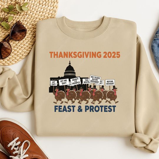 Discover Thanksgiving 2025 Feast And Protest Sweatshirt: Political Humor