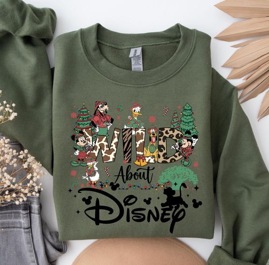 Discover Wild about Christmas Disney Animal Kingdom Shirt, Mickey & friends Safari Mode Sweaters