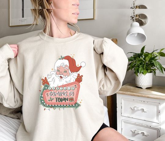 Discover Santa's Coming to Town Sweatshirt: Retro Groovy Christmas