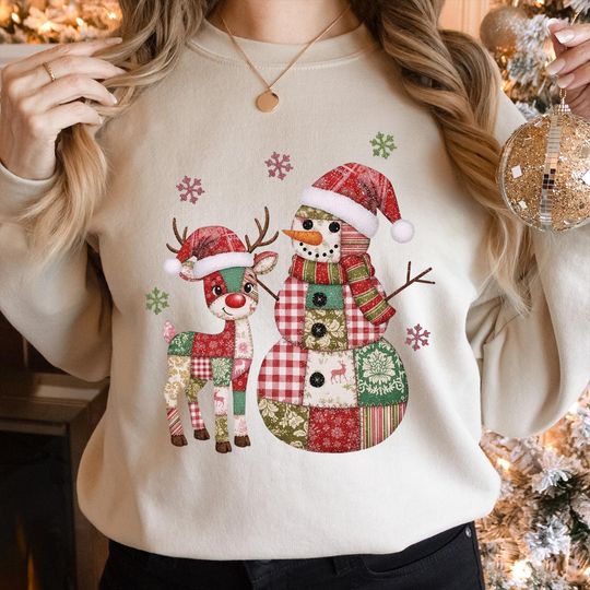 Discover Patchwork Christmas Sweatshirt: Cozy Snowman and Reindeer Winter Style