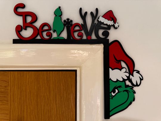 Discover Christmas door corner decoration - funny character believe.