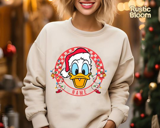 Discover Custom Name Donald Checkered Merry Christmas Sweatshirt, Retro Disney Xmas Tee, Vintage Disney Holiday Top, 2025 Family Matching Xmas Gift