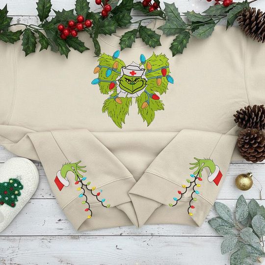 funny character Nurse Embroidered Lights Cut Hem Sweatshirt, Grin Christmas Tree Shirt, funny character Bow Sweatshirt Xmas Gift For Nurse