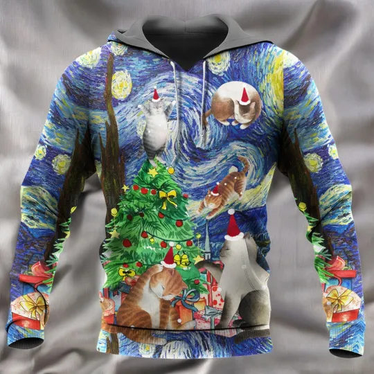Discover Christmas Cat Playing In Starry Night Hoodi
