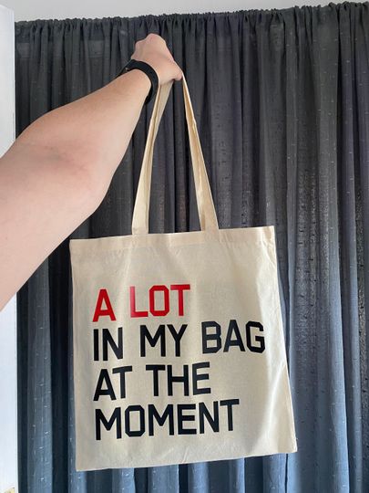 Discover Taylorr Swifts "A Lot in My Bag At the Moment" Red Album  and Vinyl Tote Bag