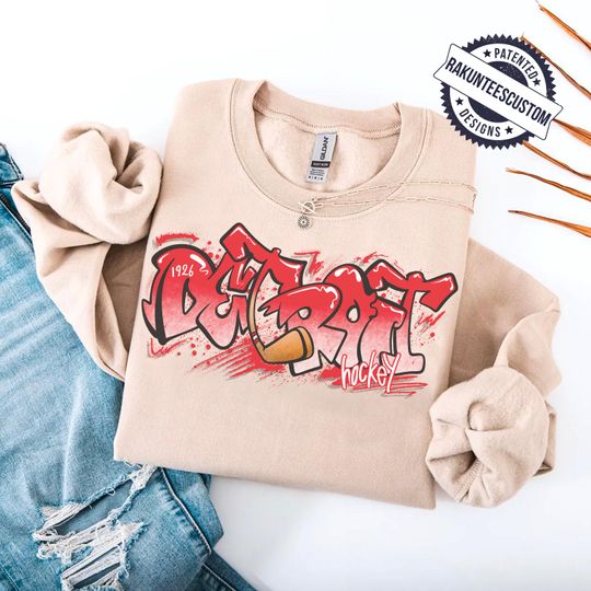 Discover Detroit Hockey Sweatshirt: Graffiti Detroit NHL Shirt