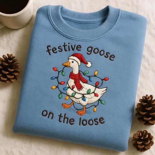 Discover Festive Goose On The Loose Christmas Sweatshirt, Embroidered Holiday Bird Gift, Funny Xmas Lights Animal Hoodie