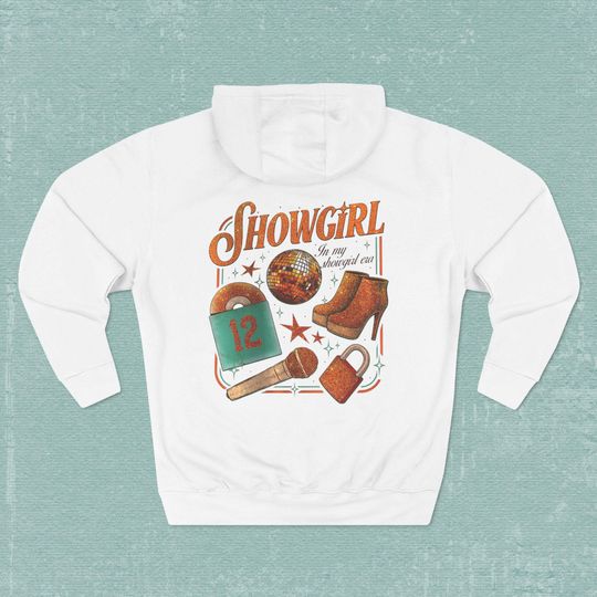 Discover Showgirl-Themed Fleece Hoodie, Pop Star Inspired Shirt, Orange Era, Retro Music Lover Sweatshirt, Stage and Spotlight, Cute Teen Hoodie Gift