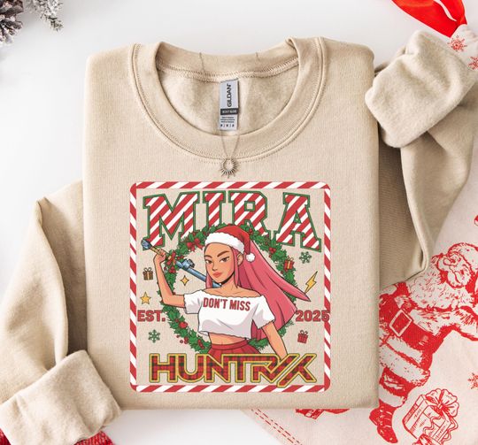 Discover Empowering Christmas Sweatshirt, Mira Don't Miss Graphic, Festive Female Character Holiday Apparel, Bold Xmas Wreath Design