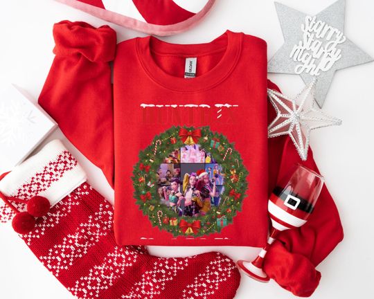 Discover HUNTRIX Christmas Wreath Sweatshirt, Festive Animated Holiday Hoodie with Candy Canes, Playful Xmas Character Apparel for Fans